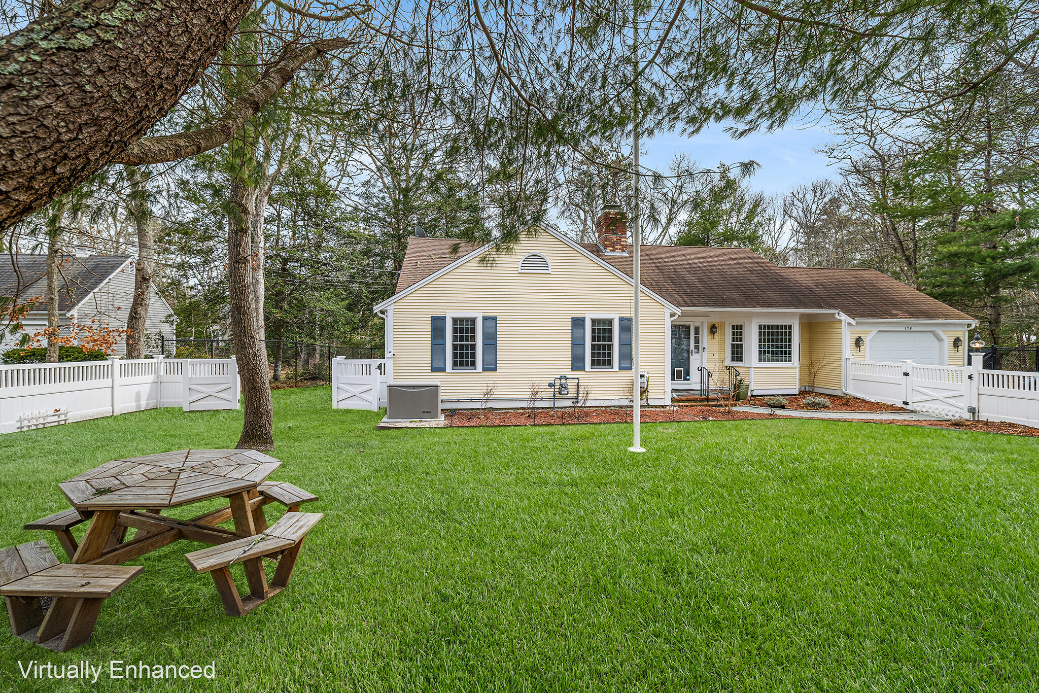 175 Old Post Road Centerville, MA 02632 - Photo 25 of 28 a house view with a sitting space and garden