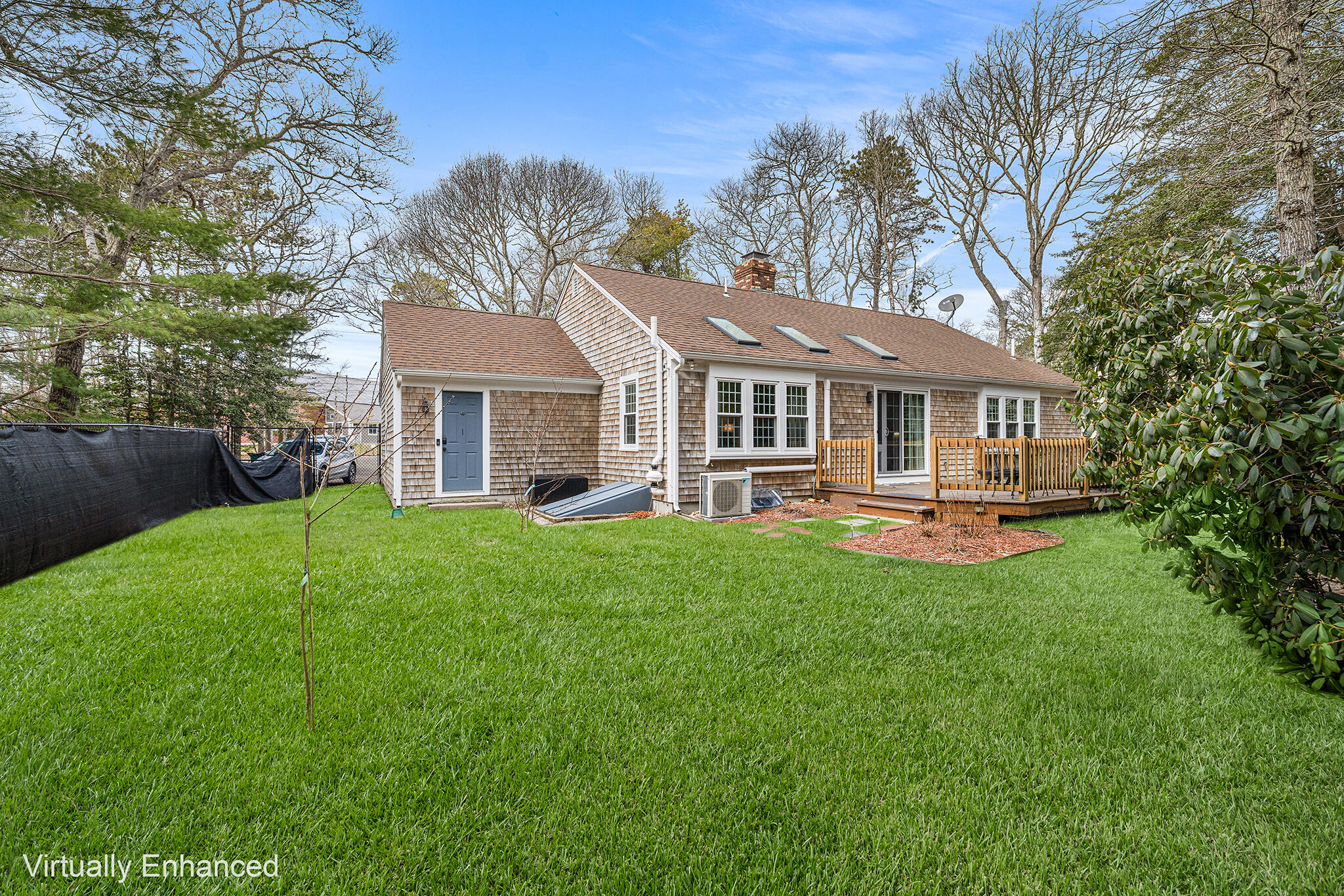 175 Old Post Road Centerville, MA 02632 - Photo 26 of 28 a front view of a house with yard and green space