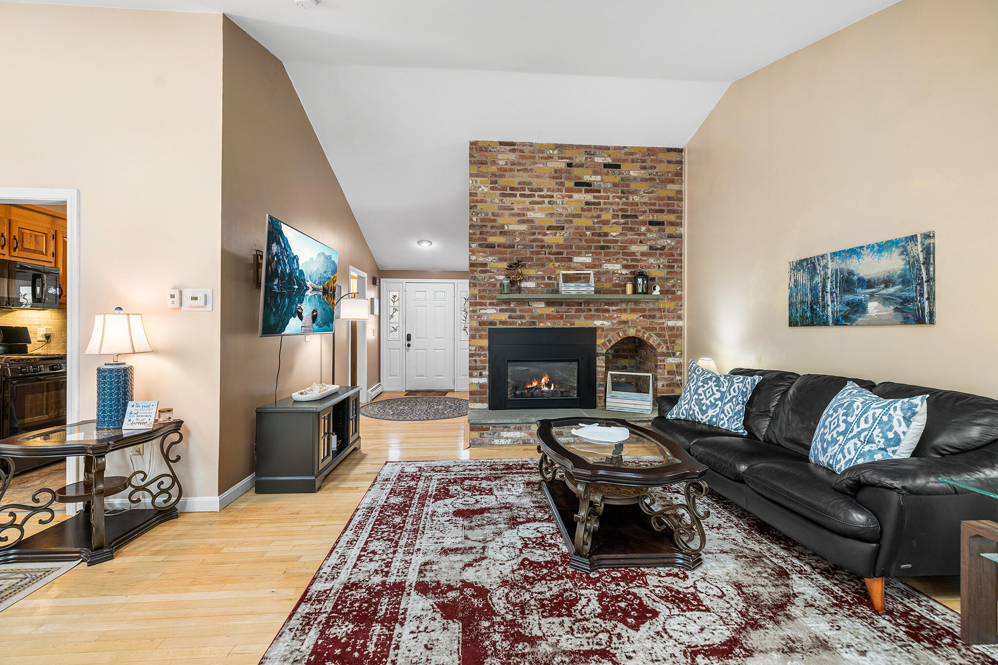 175 Old Post Road Centerville, MA 02632 - Photo 3 of 28 a living room with furniture and a fireplace