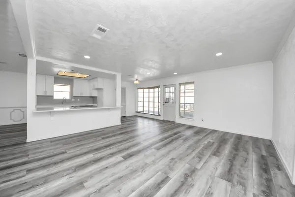 a view of an empty room and window