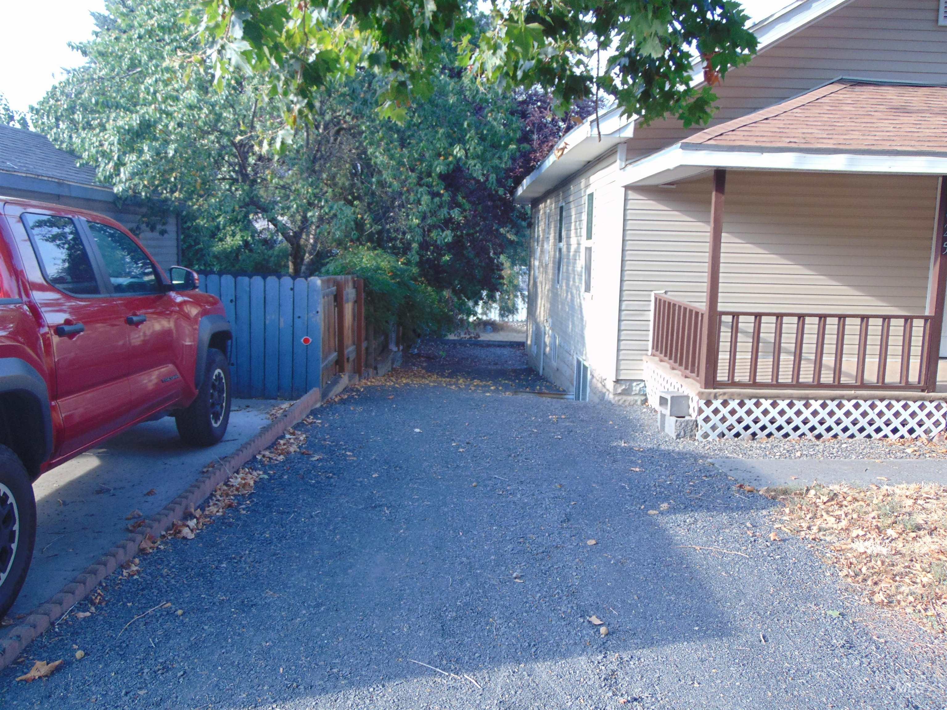 1825 7th Avenue Lewiston, ID 83501 - Photo 4 of 26 View of side of property featuring a wooden deck