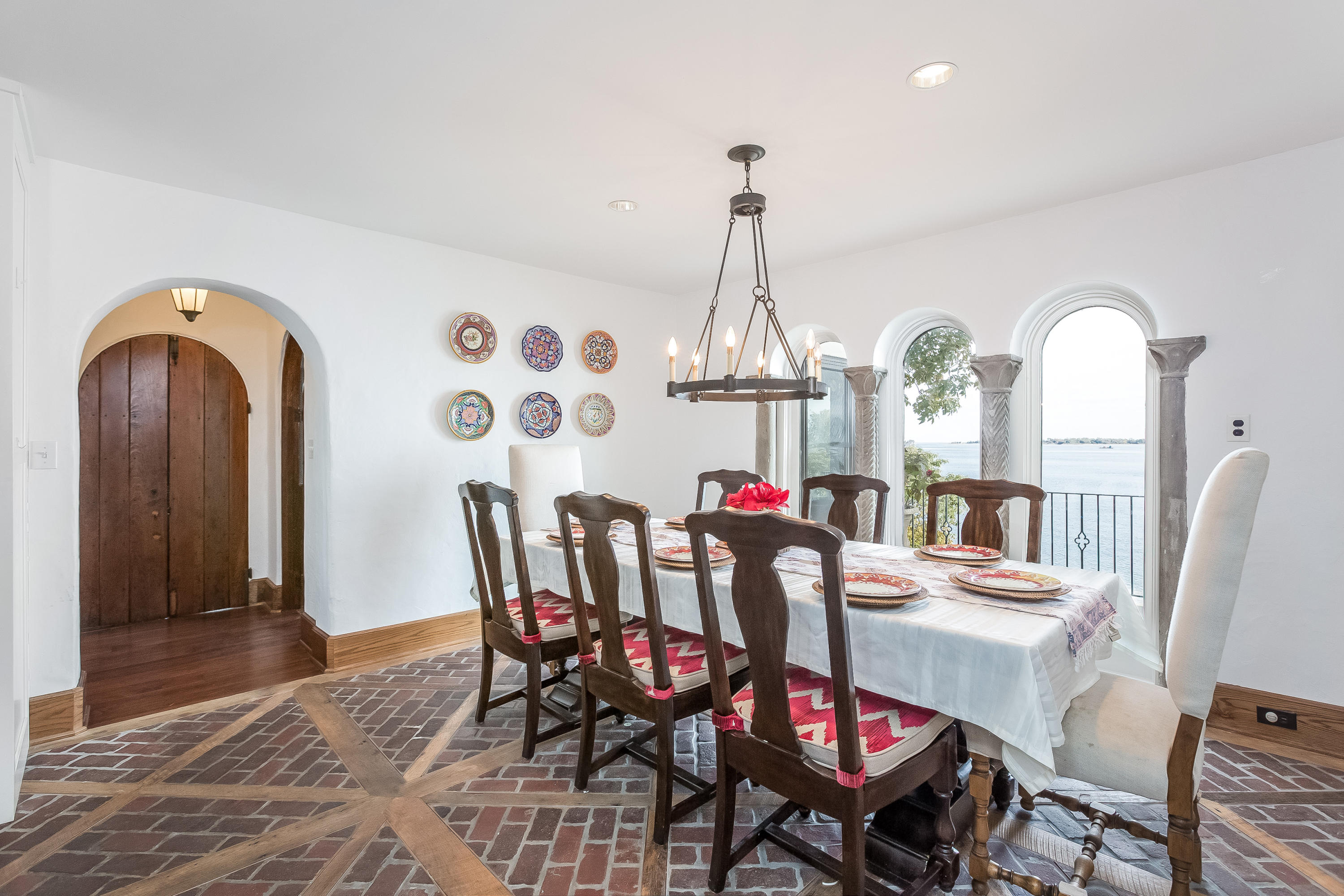8 Woodland Road Norwalk, CT 06854 - Photo 11 of 44 a view of a dining room with furniture and chandelier