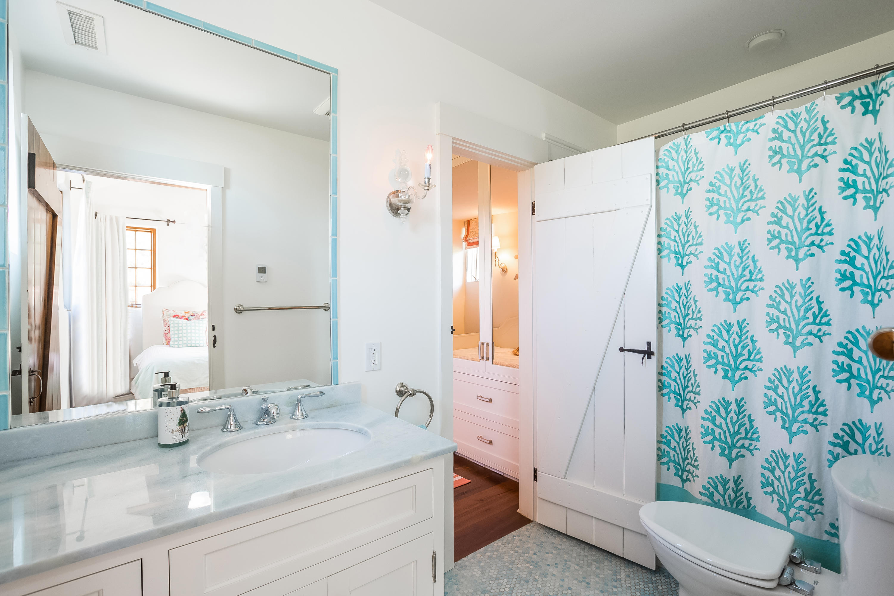 8 Woodland Road Norwalk, CT 06854 - Photo 28 of 44 a bathroom with a granite countertop sink a toilet and a mirror