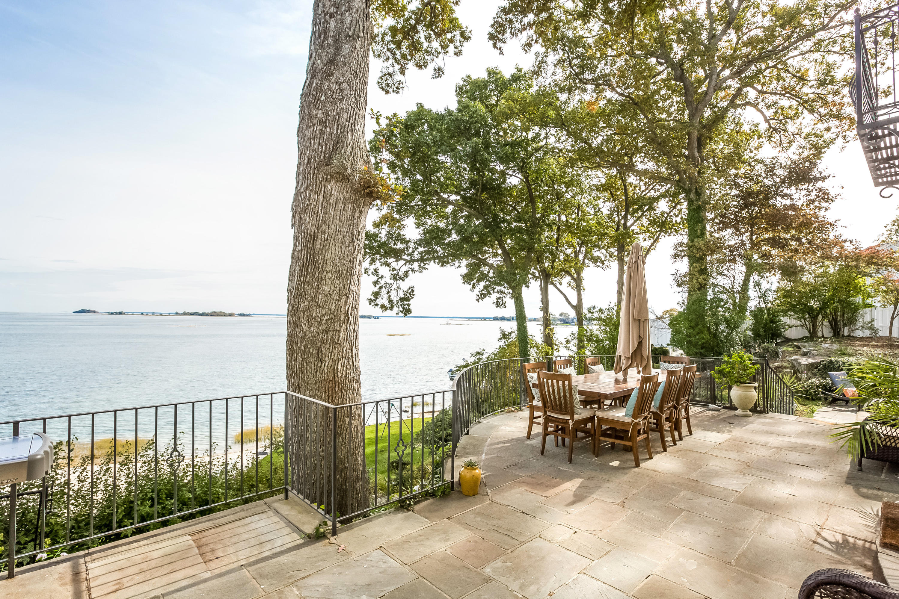 8 Woodland Road Norwalk, CT 06854 - Photo 38 of 44 a view of a terrace with sitting area and garden