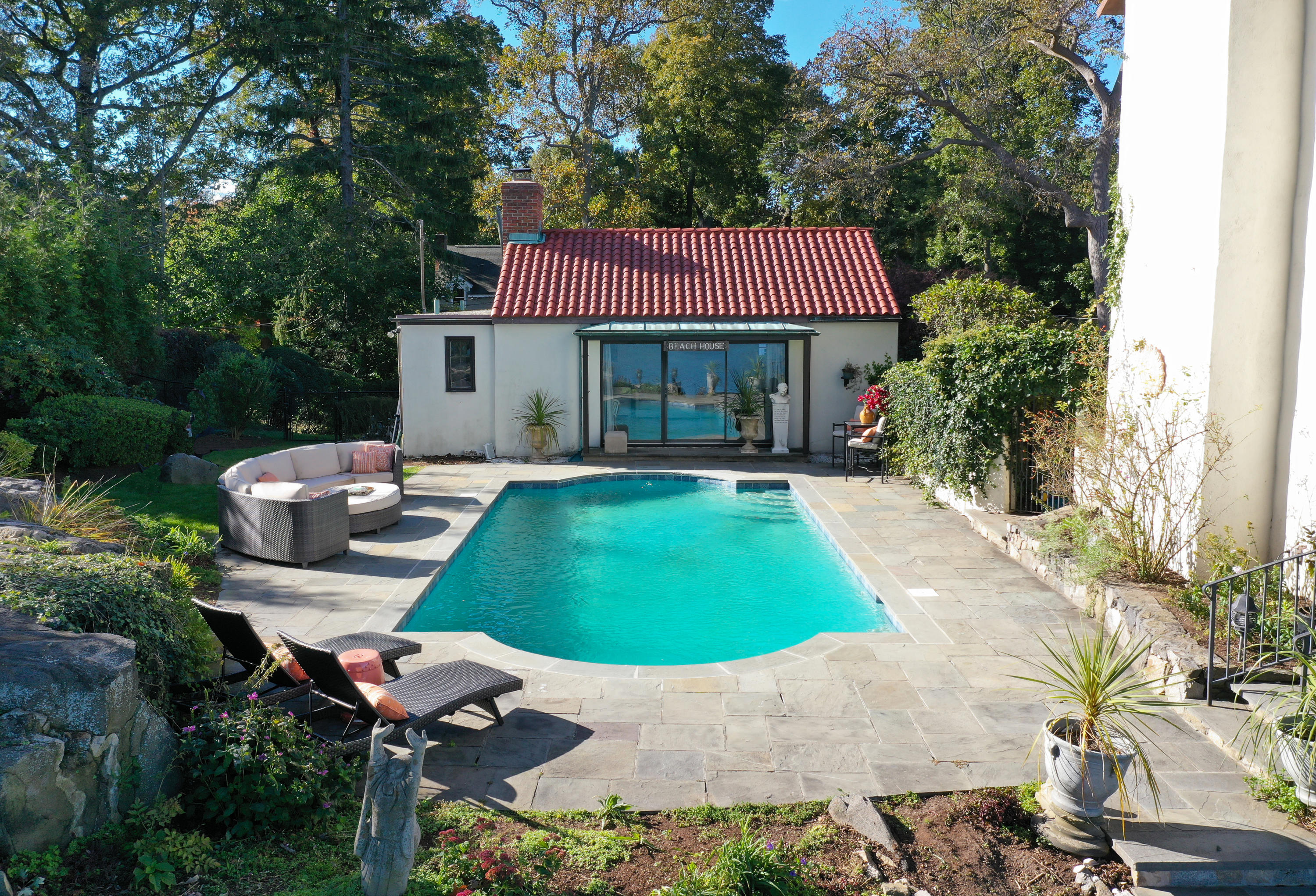 8 Woodland Road Norwalk, CT 06854 - Photo 5 of 44 an aerial view of a house with swimming pool garden and patio