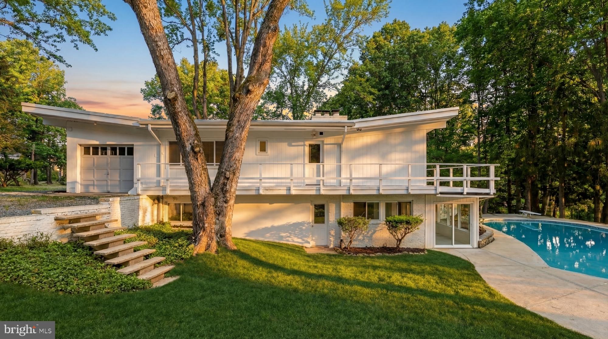 10903 Beach Mill Road Great Falls, VA 22066 - Photo 2 of 25 Private setting with gently rolling landscape