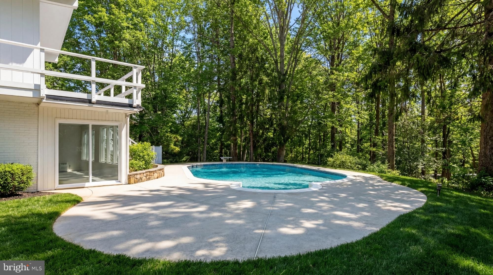 10903 Beach Mill Road Great Falls, VA 22066 - Photo 24 of 25 Private pool surrounded by mature trees