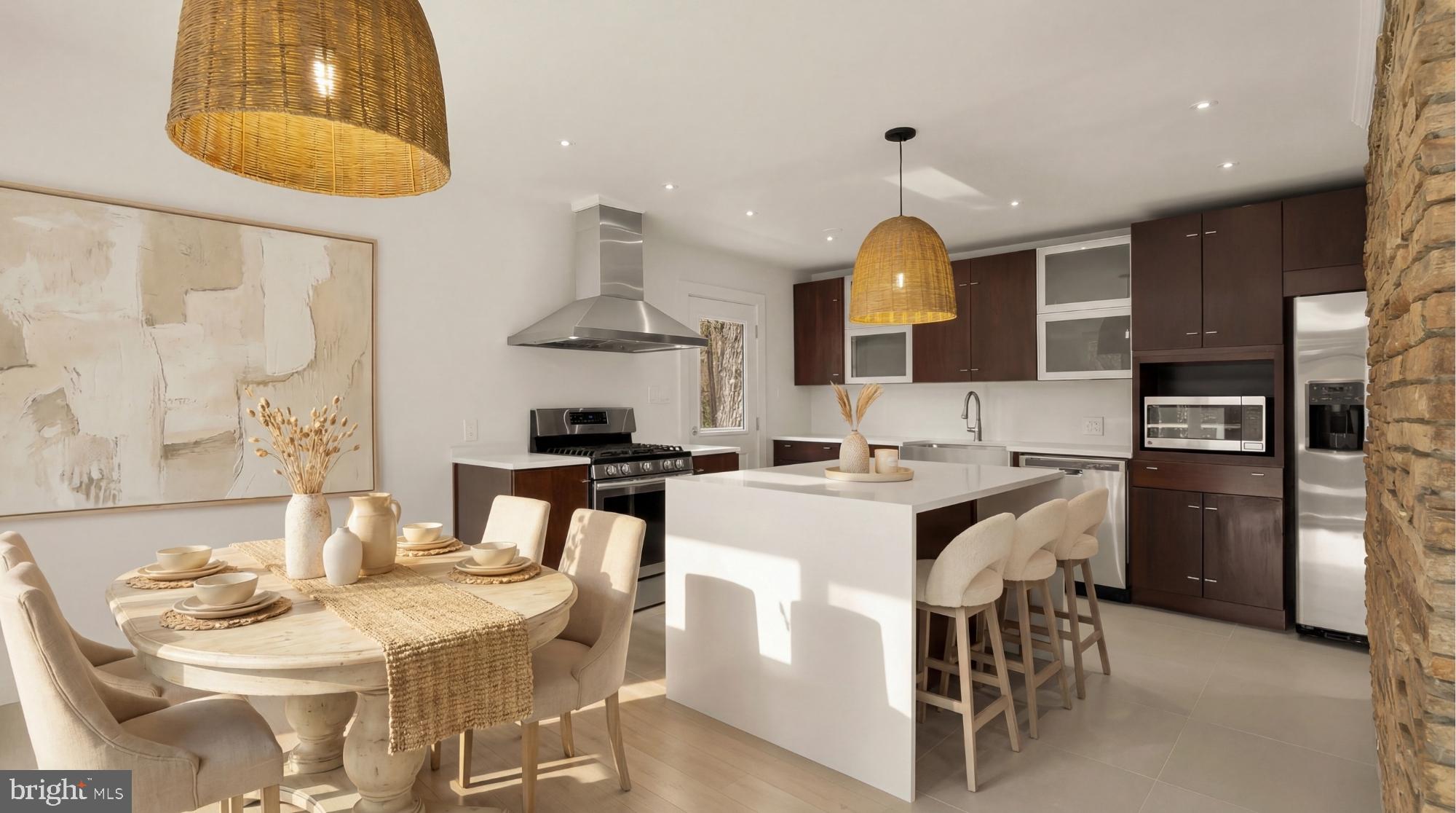 10903 Beach Mill Road Great Falls, VA 22066 - Photo 10 of 25 Kitchen positioned at the heart of the home