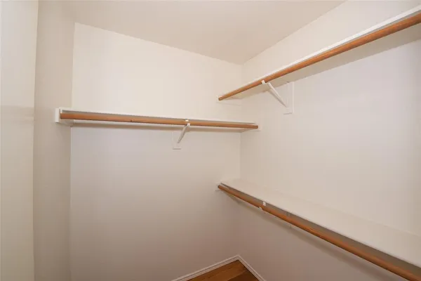 a view of a backyard and floor to ceiling window