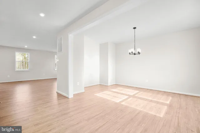 a bathroom with a sink toilet and mirror