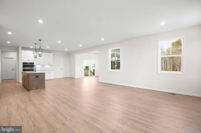 a view of kitchen with wooden floor