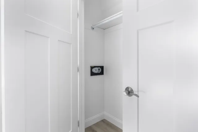 a en suite bathroom with a sink and a mirror