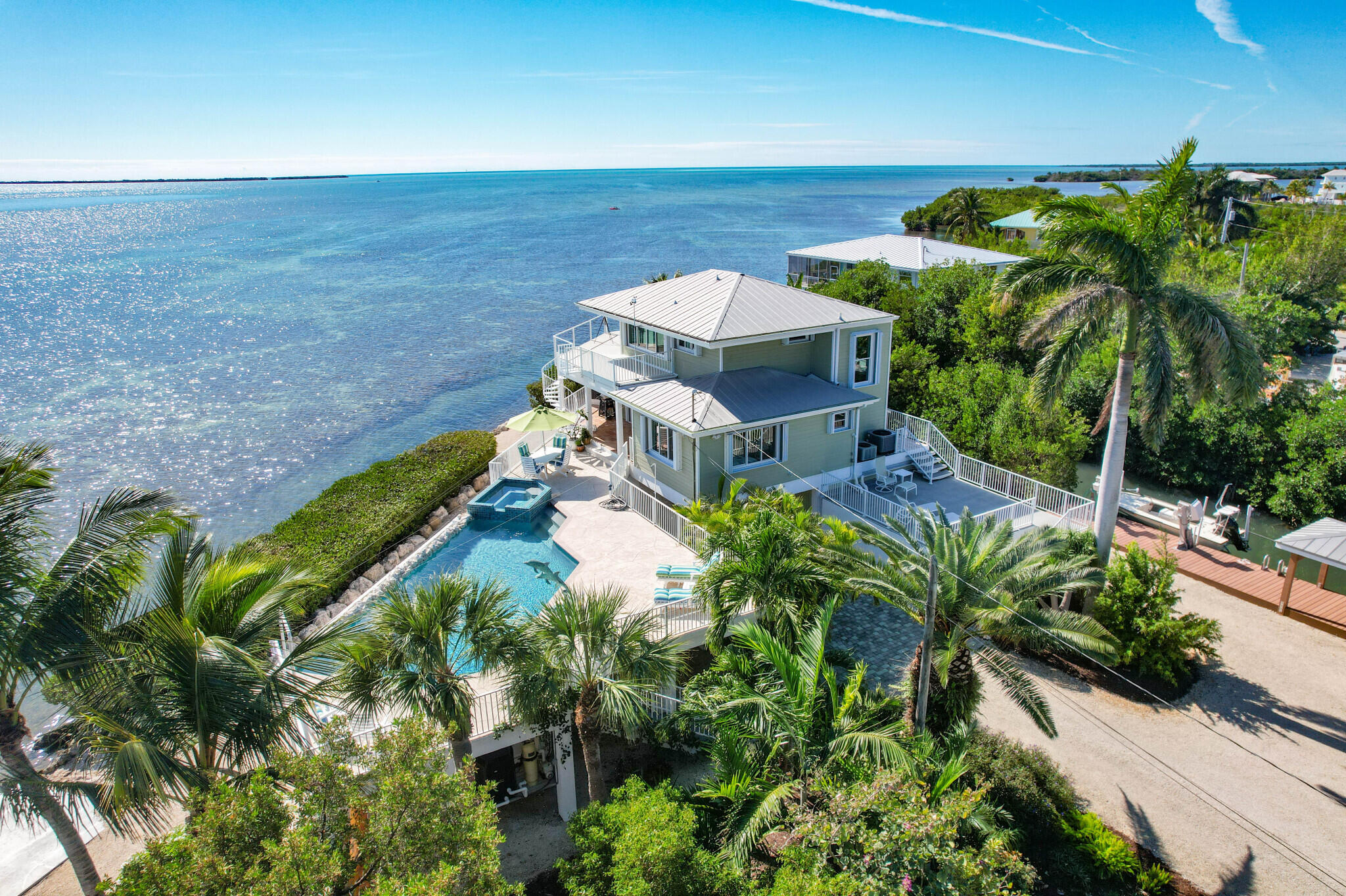 a view of a house with a ocean view