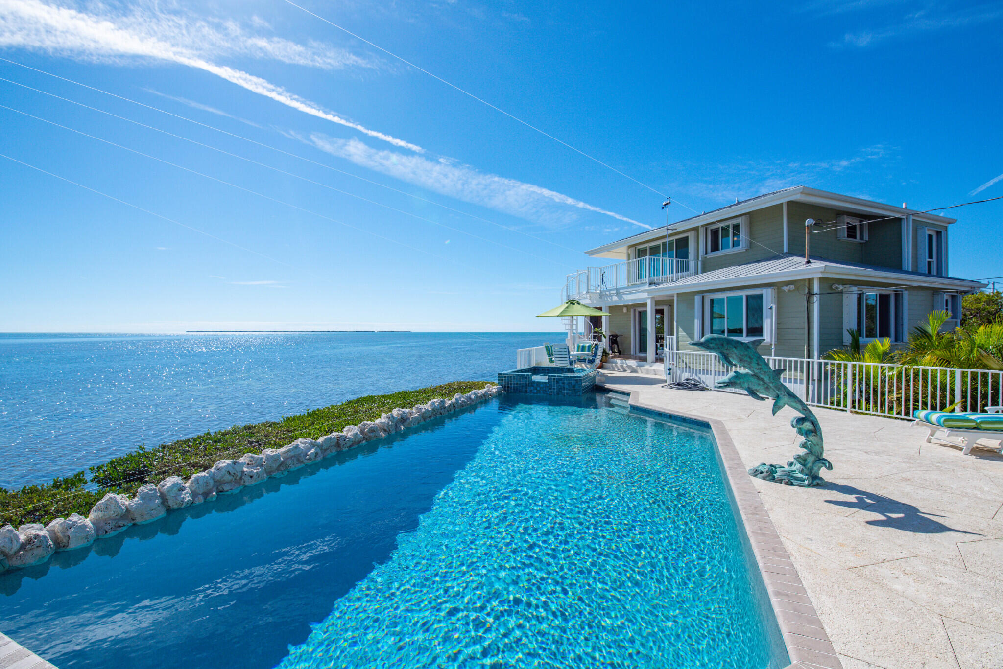 1176 Thatch Lane Cudjoe, FL 33042 - Photo 14 of 41 a view of a house with a yard