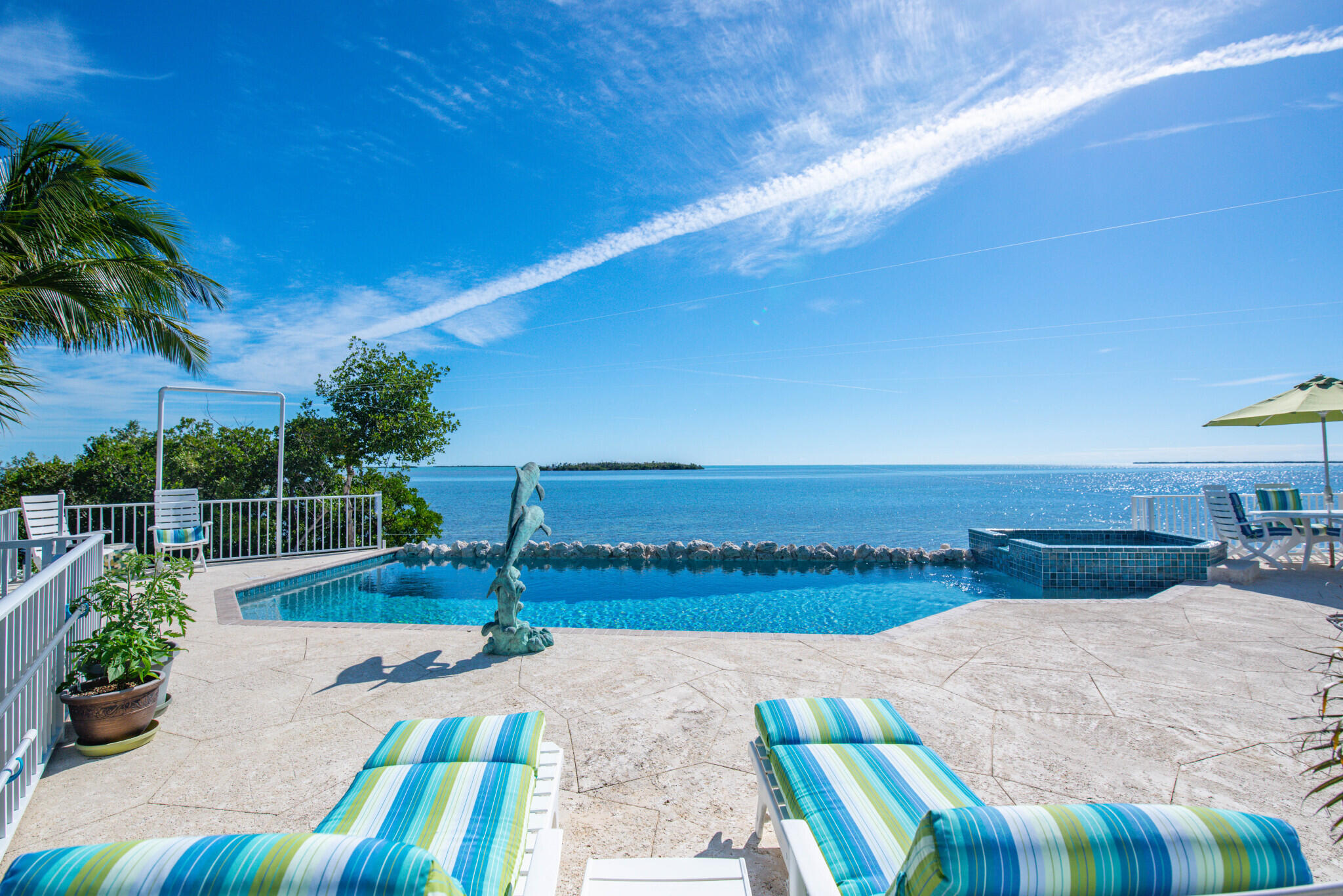 1176 Thatch Lane Cudjoe, FL 33042 - Photo 15 of 41 a view of a backyard with swimming pool