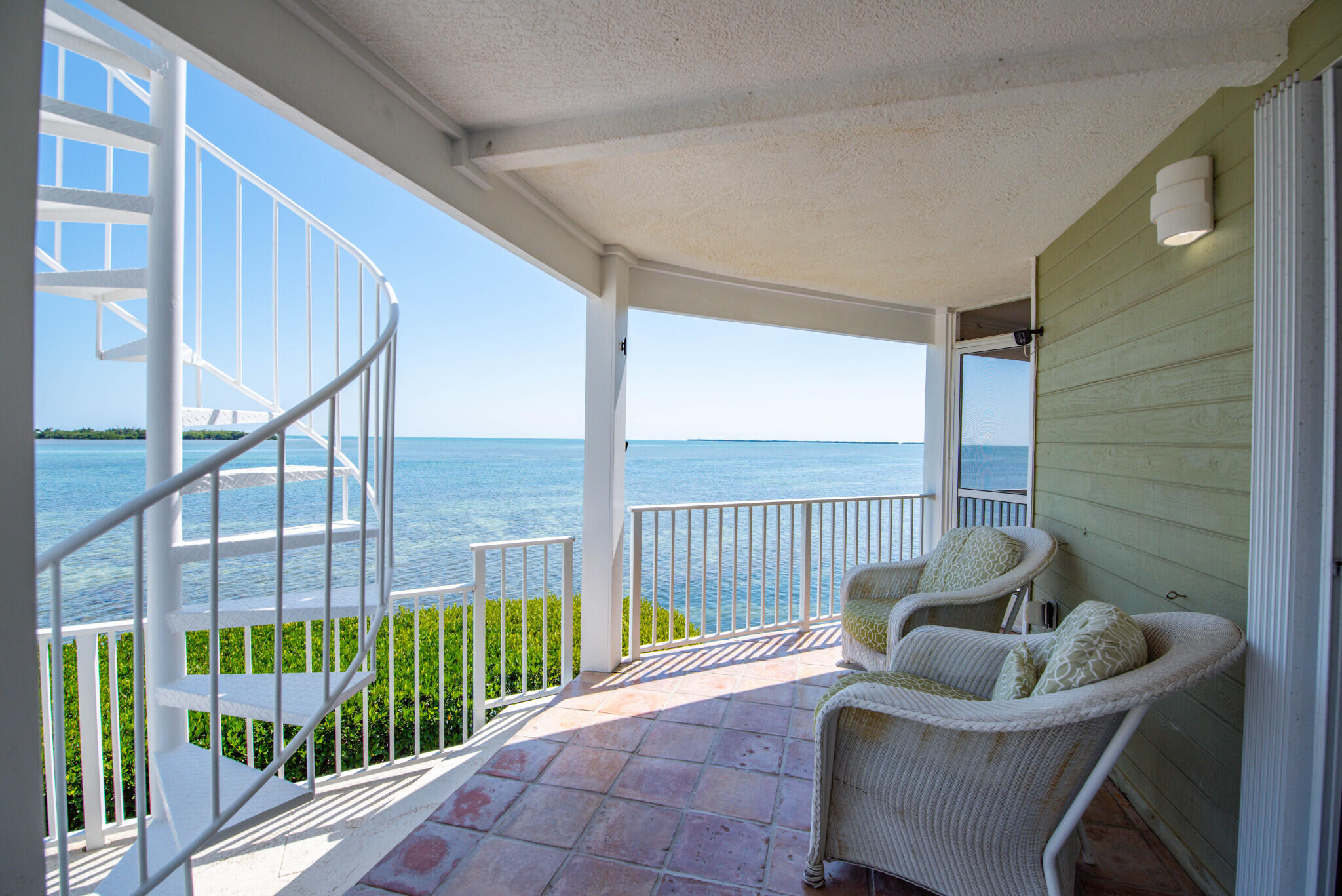 1176 Thatch Lane Cudjoe, FL 33042 - Photo 18 of 41 a balcony with furniture