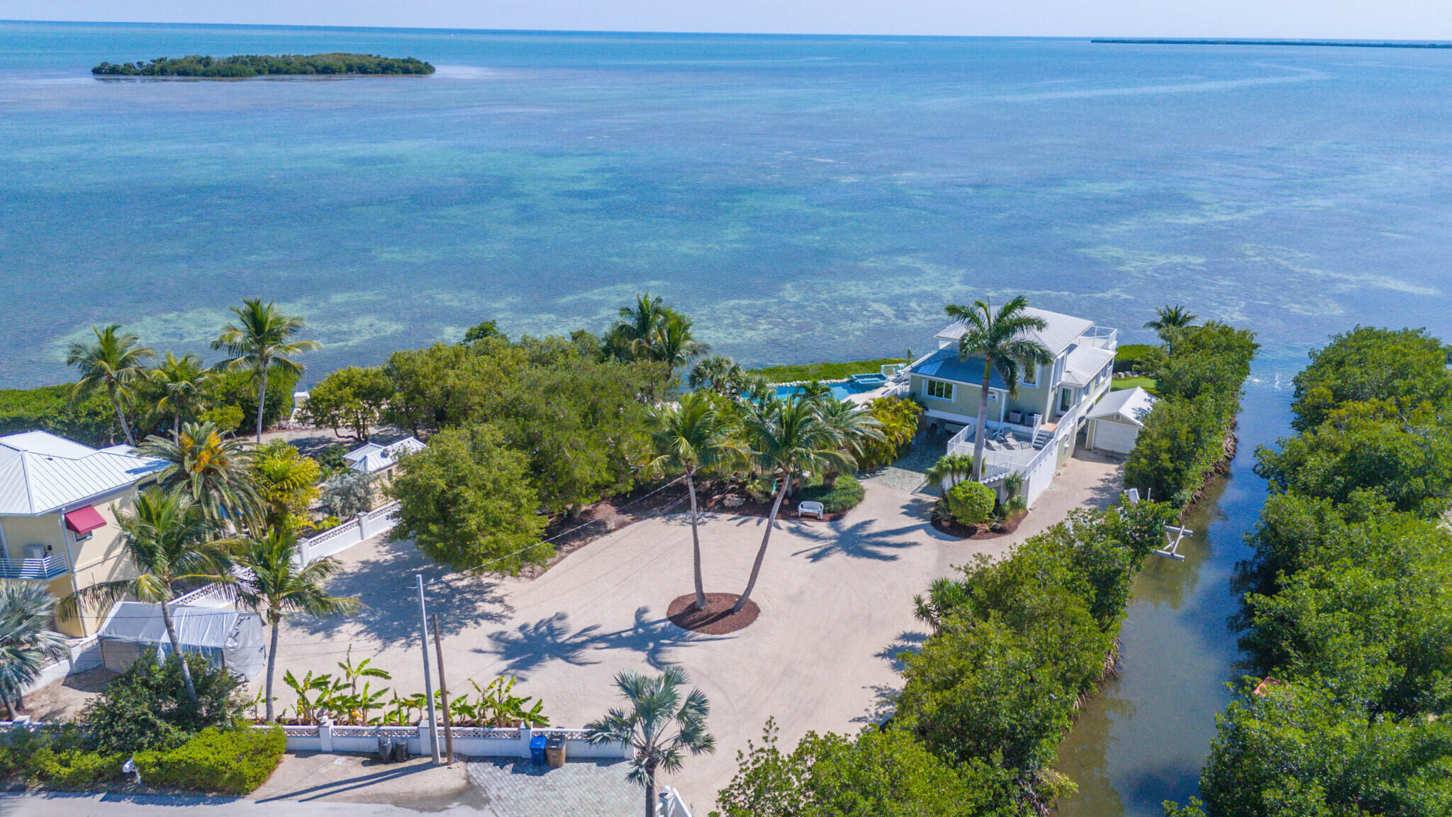 1176 Thatch Lane Cudjoe, FL 33042 - Photo 5 of 41 an aerial view of a house with a yard