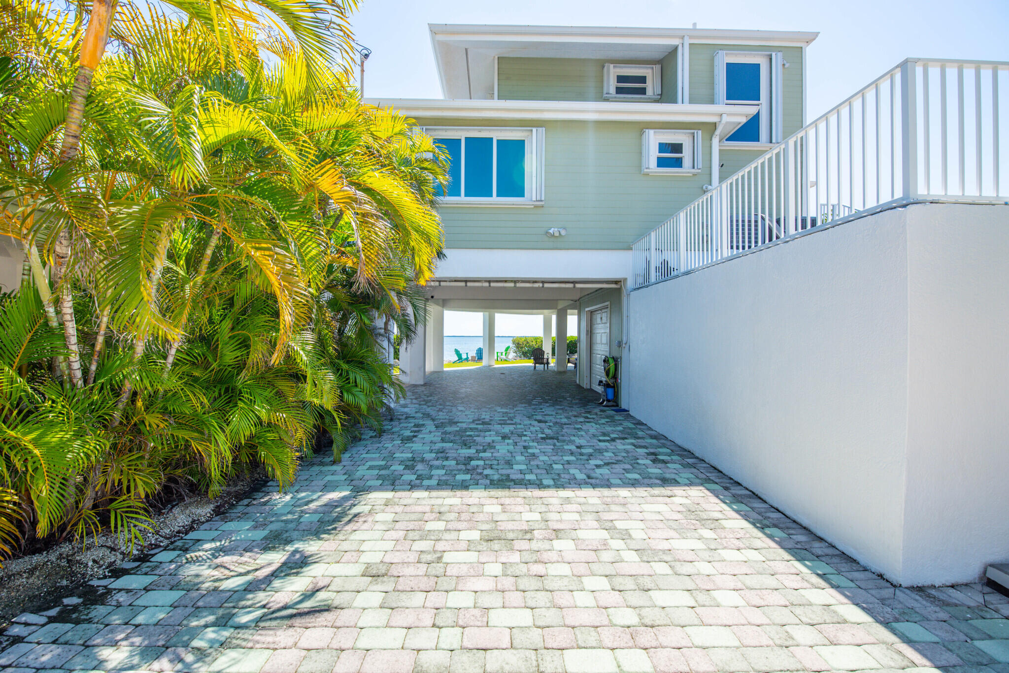 1176 Thatch Lane Cudjoe, FL 33042 - Photo 8 of 41 a view of entrance gate of the house