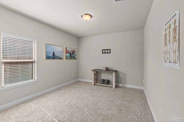 a room with furniture and a window