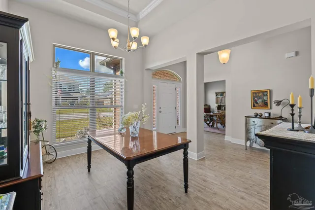a view of a livingroom with furniture and window
