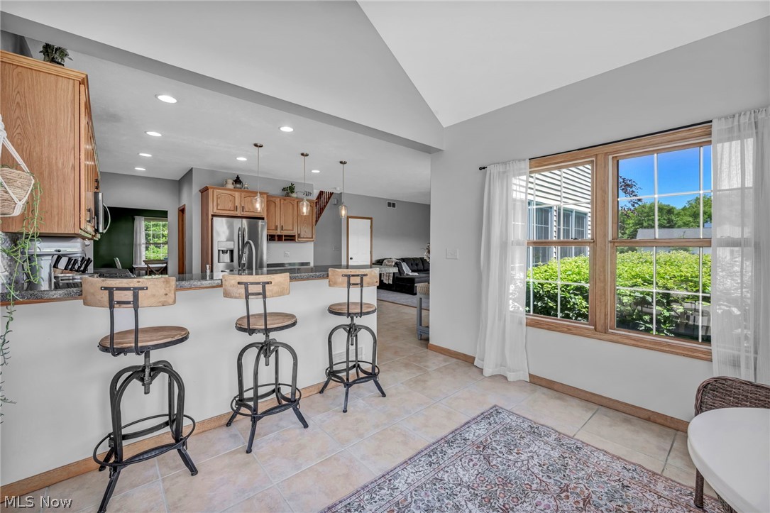 14353 Radcliffe Road Chardon, OH 44024 - Photo 23 of 50 kitchen bar area/ sunroom