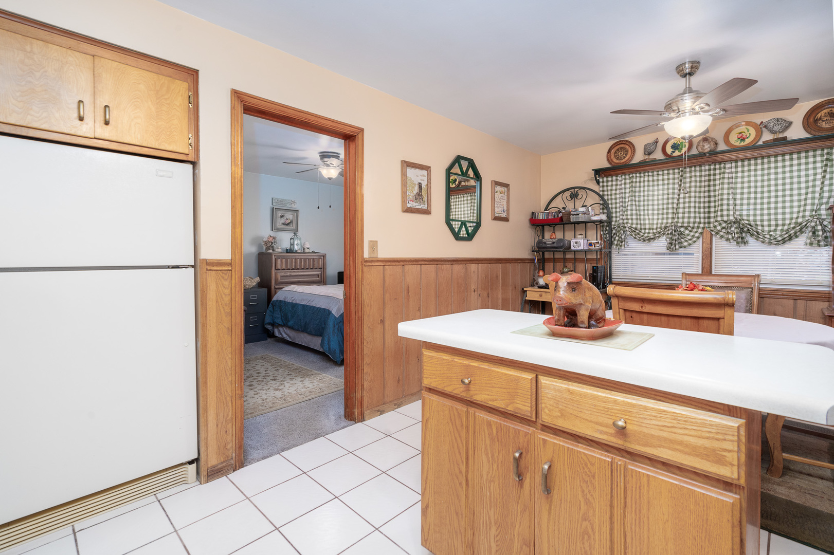 4225 West Marquette Road Chicago, IL 60629 - Photo 11 of 26 a kitchen with a refrigerator and a sink