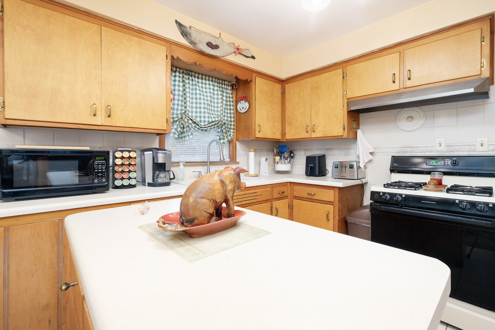 4225 West Marquette Road Chicago, IL 60629 - Photo 12 of 26 a kitchen with stainless steel appliances and a refrigerator