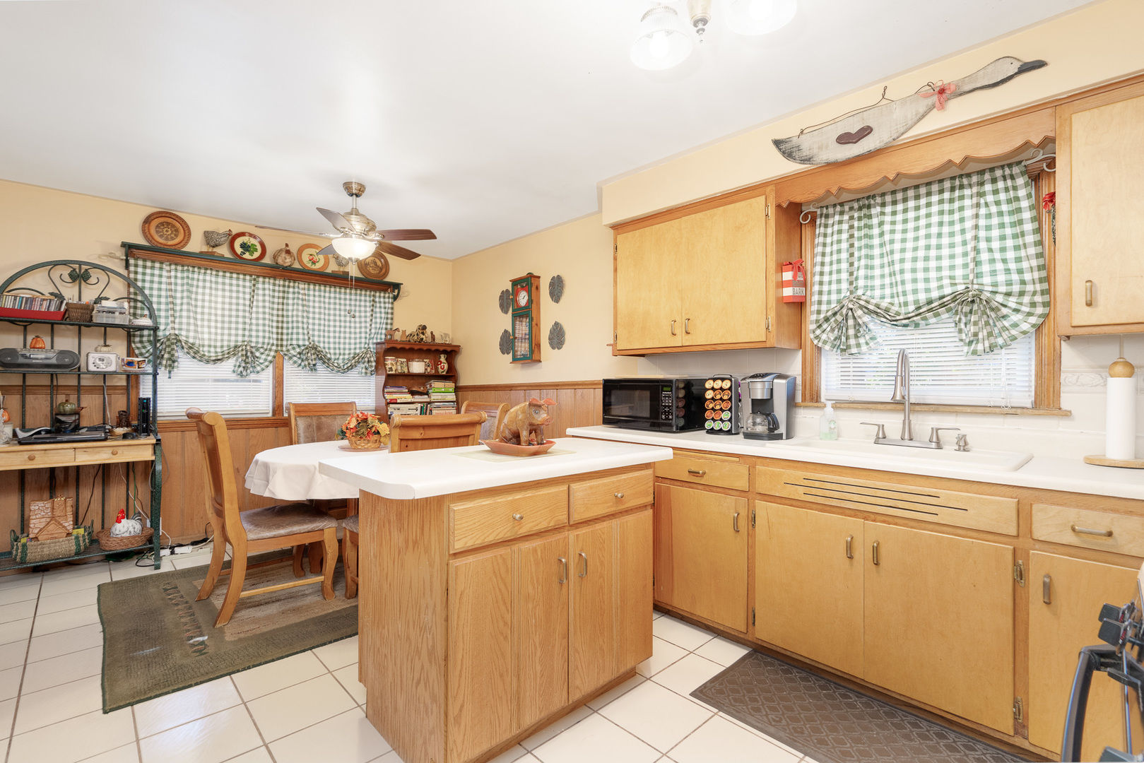 4225 West Marquette Road Chicago, IL 60629 - Photo 13 of 26 a kitchen with a sink stove and cabinets