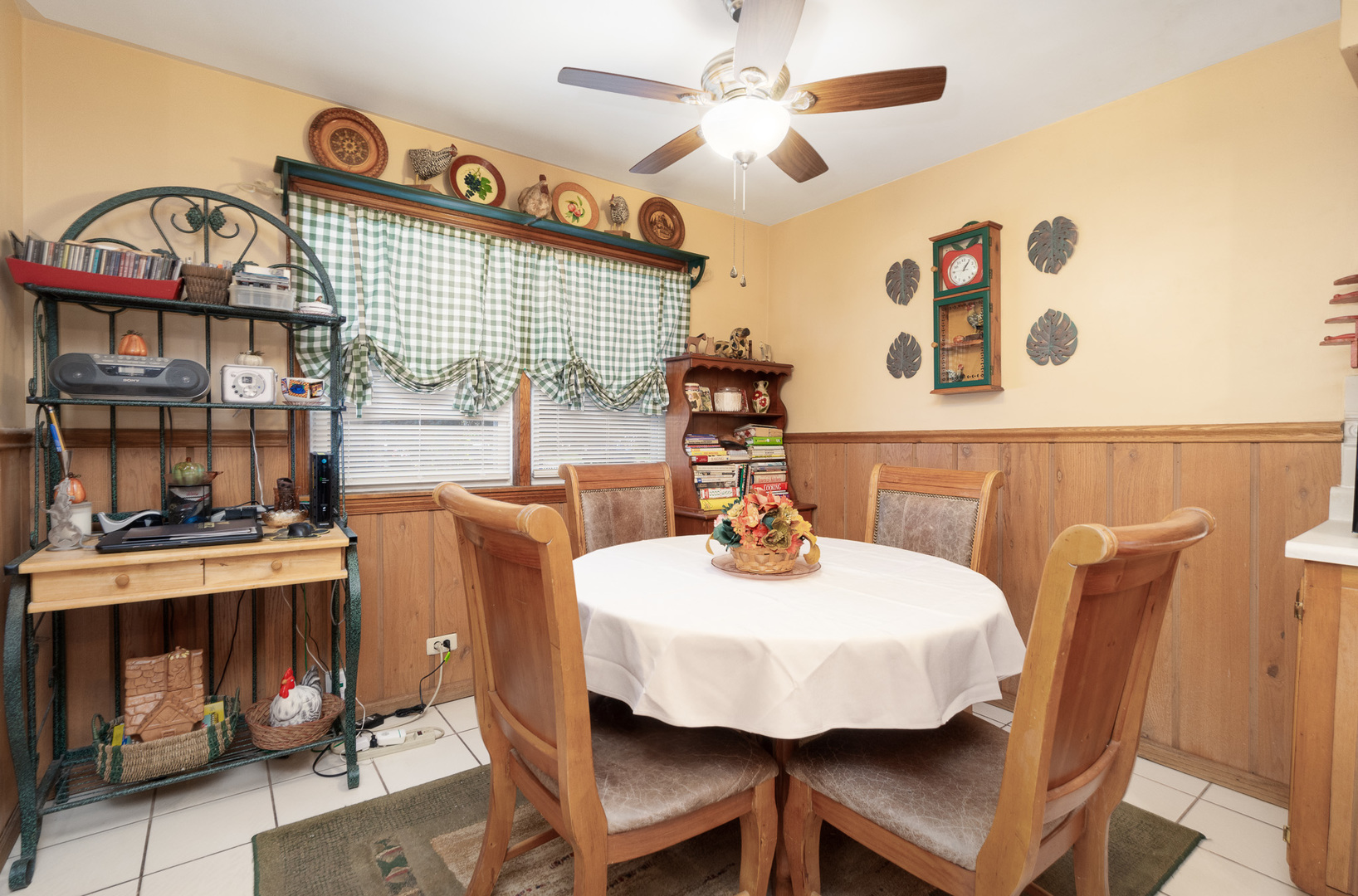 4225 West Marquette Road Chicago, IL 60629 - Photo 14 of 26 a view of a dining room with furniture and a chandelier