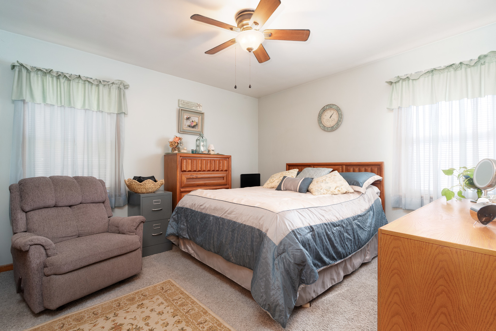 4225 West Marquette Road Chicago, IL 60629 - Photo 15 of 26 a bedroom with a bed couch and window