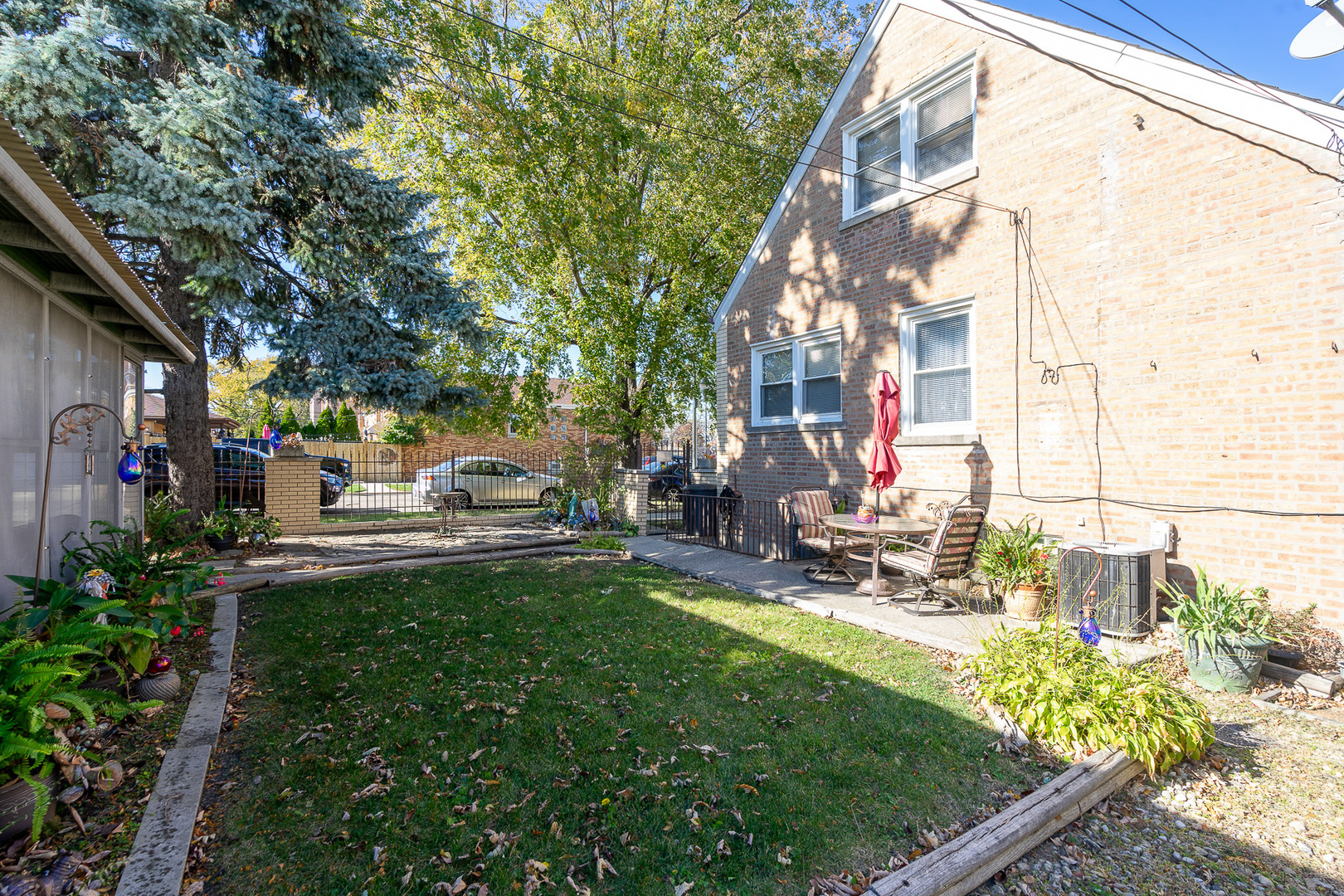4225 West Marquette Road Chicago, IL 60629 - Photo 25 of 26 a couple of table and chairs in the yard
