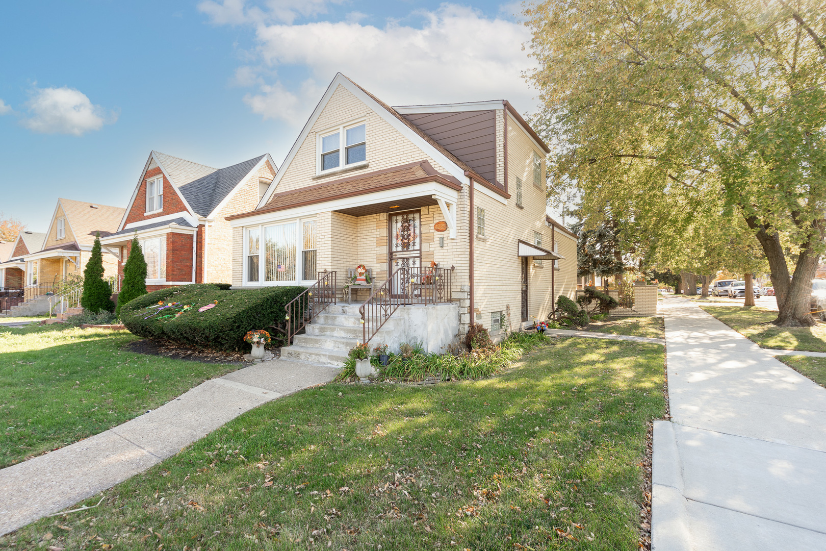 4225 West Marquette Road Chicago, IL 60629 - Photo 26 of 26 a front view of a house with a yard