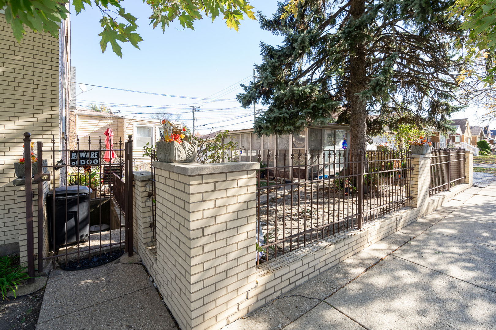 4225 West Marquette Road Chicago, IL 60629 - Photo 3 of 26 a view of a pathway with buildings