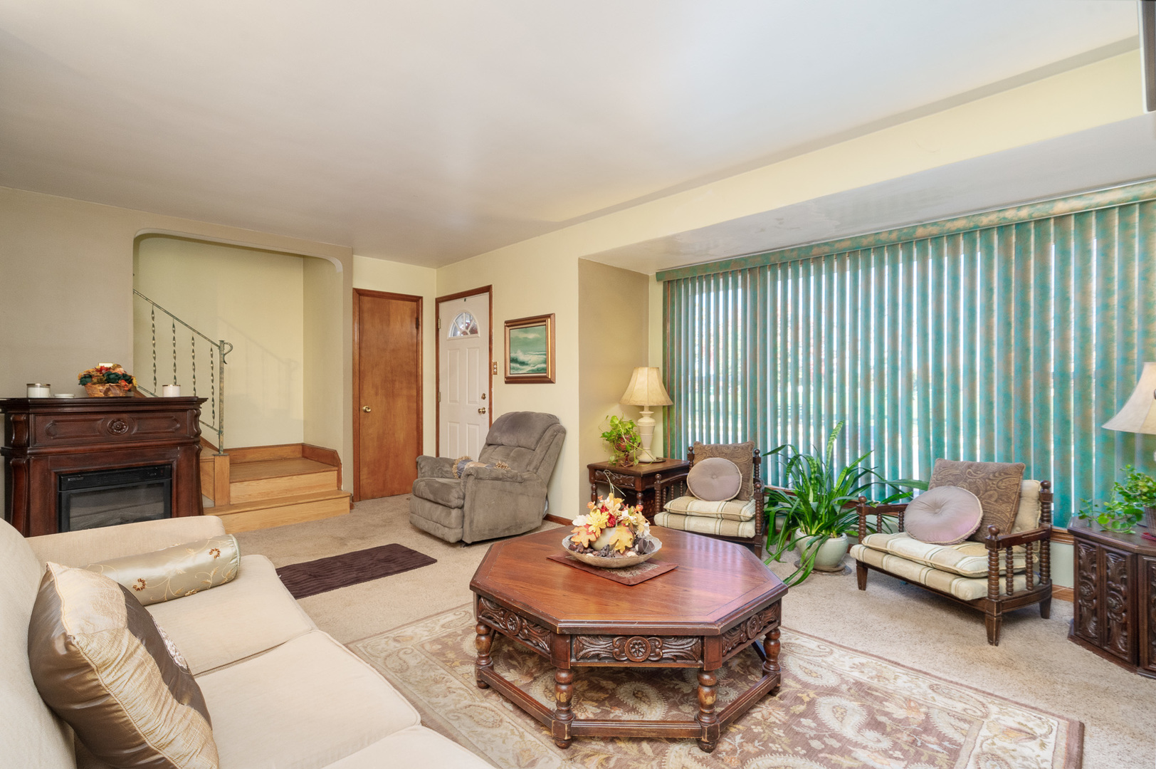 4225 West Marquette Road Chicago, IL 60629 - Photo 5 of 26 a living room with furniture and a potted plant