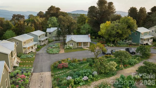 an aerial view of a house with a garden