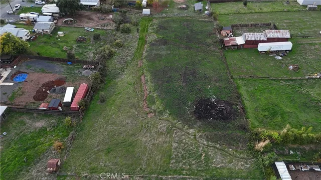 a view of a golf course with a house