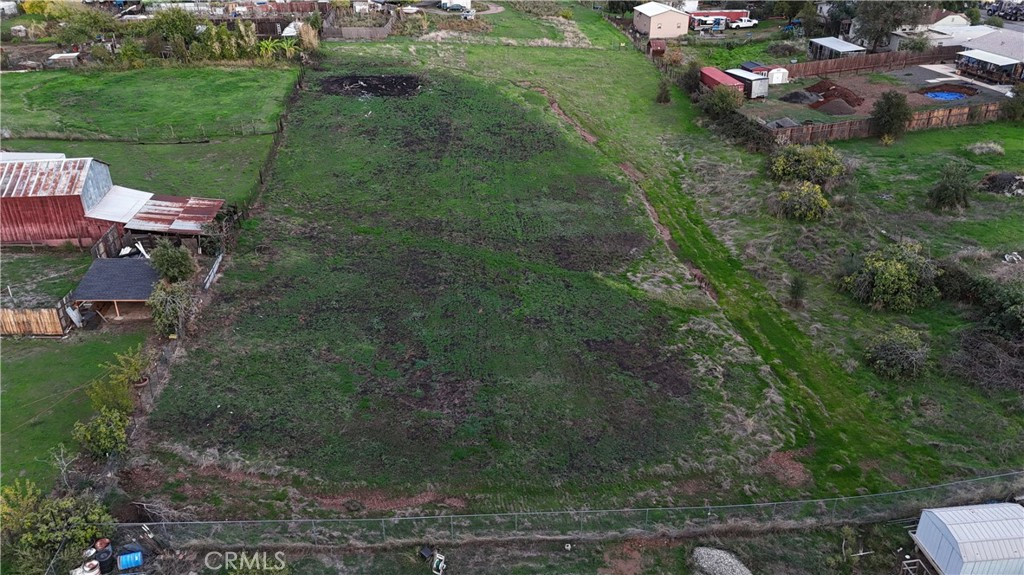 0 10th Street Oroville, CA 95965 - Photo 5 of 5 a view of a backyard with plants and a park