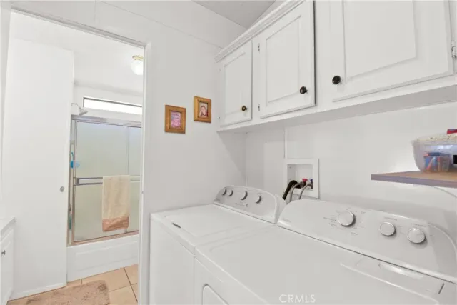 a bathroom with a sink and cabinets