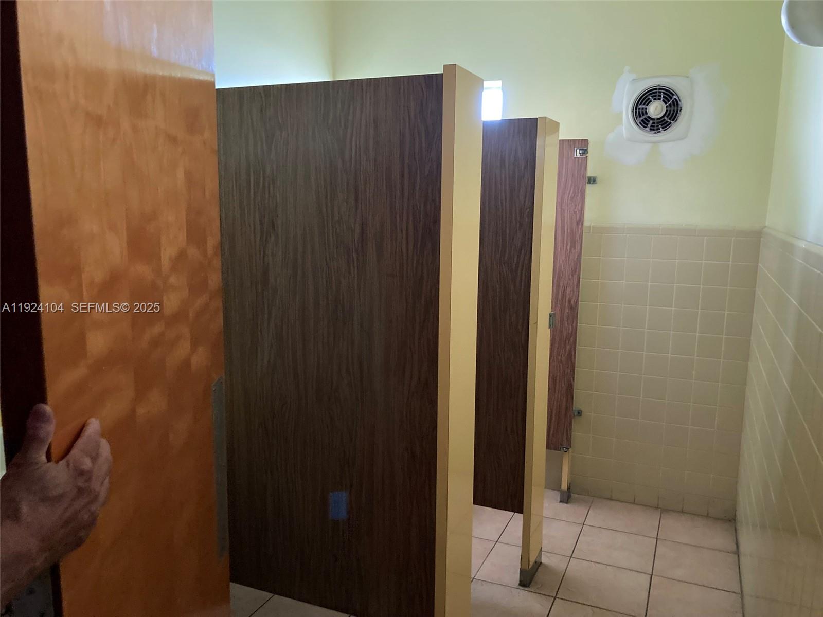 5300 Washington Street, Unit N117 Hollywood, FL 33021 - Photo 81 of 99 a bathroom with a shower and a sink