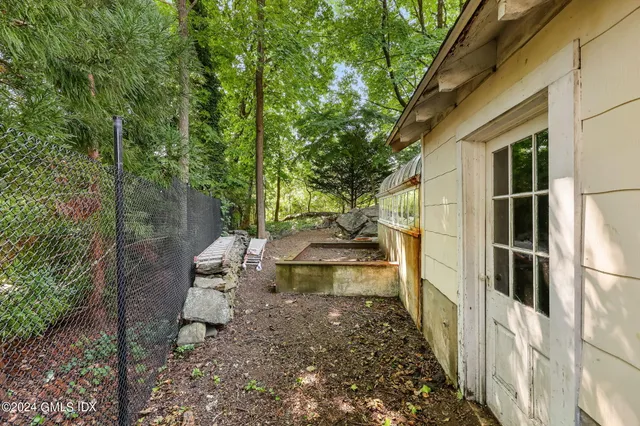 a view of a back yard from a patio