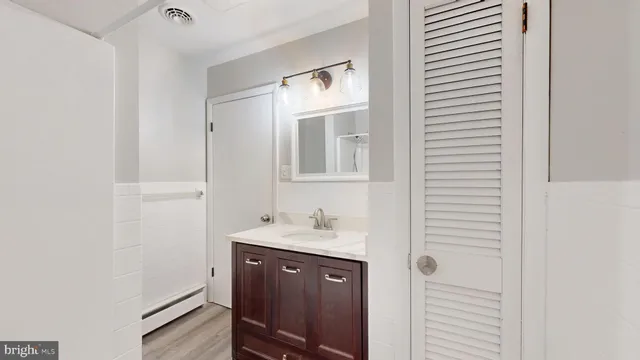 a bathroom with a sink and a toilet