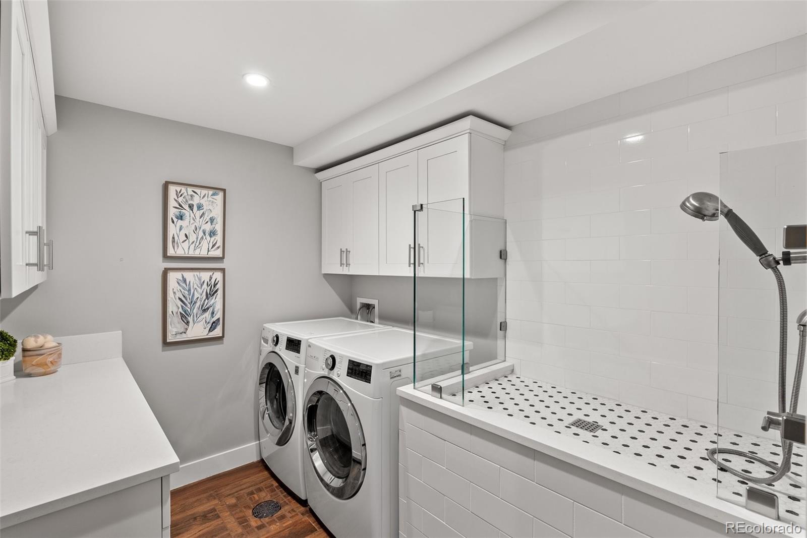 9218 South Turkey Creek Road Morrison, CO 80465 - Photo 28 of 44 a utility room with dryer and washer