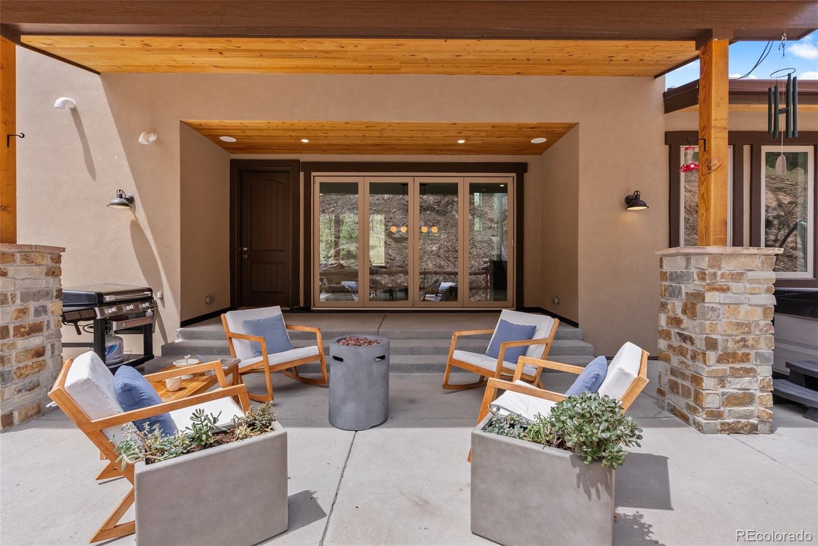 9218 South Turkey Creek Road Morrison, CO 80465 - Photo 5 of 44 a view of an outdoor seating area