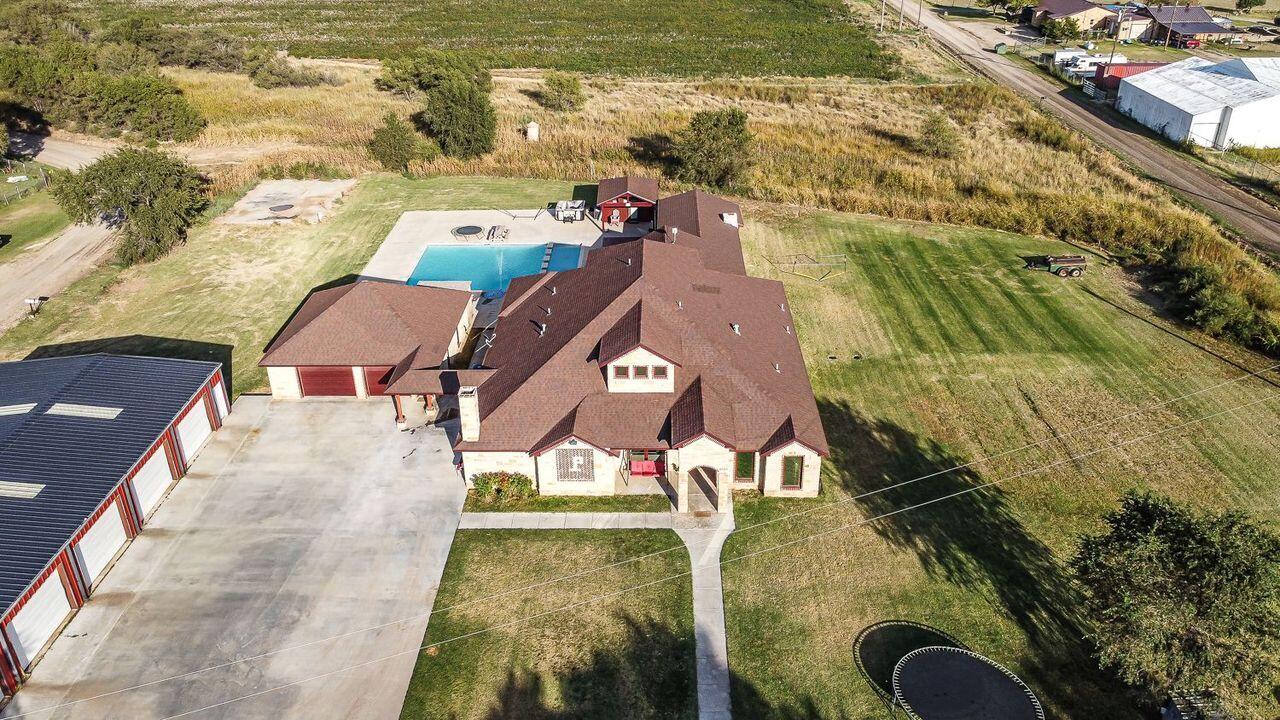 6523 East C R 6200 Lubbock, TX 79403 - Photo 2 of 86 a view of an ocean from a balcony