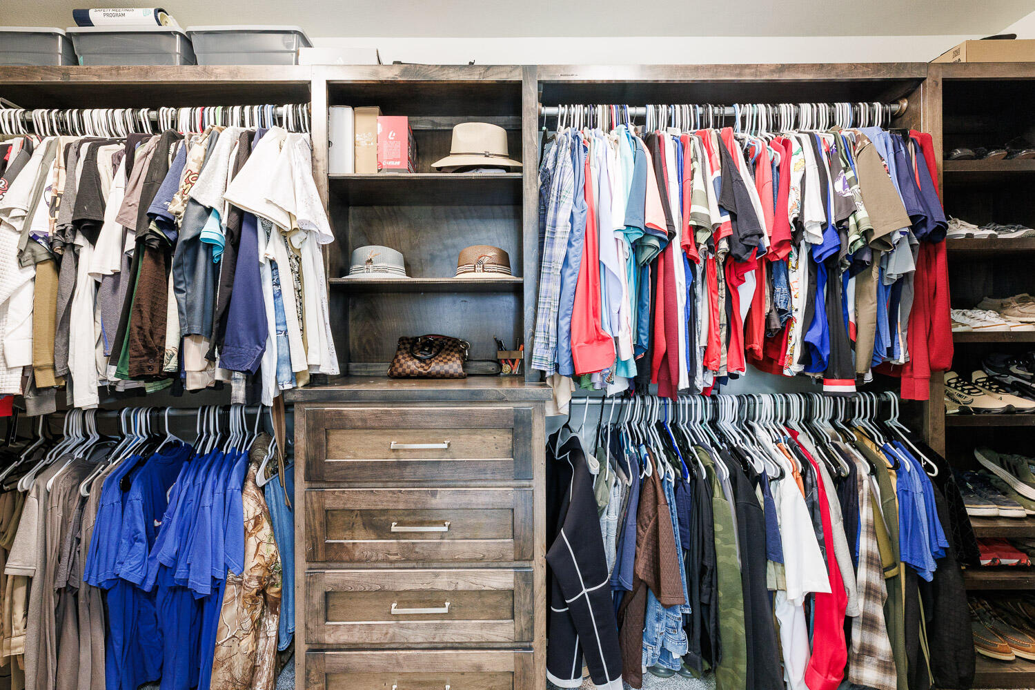 6523 East C R 6200 Lubbock, TX 79403 - Photo 41 of 86 a view of walk in closet with clothes and shoes