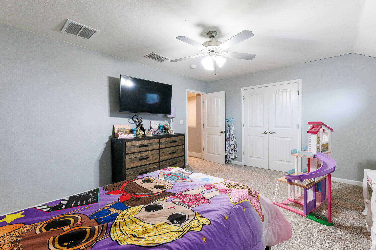 6523 East C R 6200 Lubbock, TX 79403 - Photo 49 of 86 a bedroom with a bed and a flat screen tv