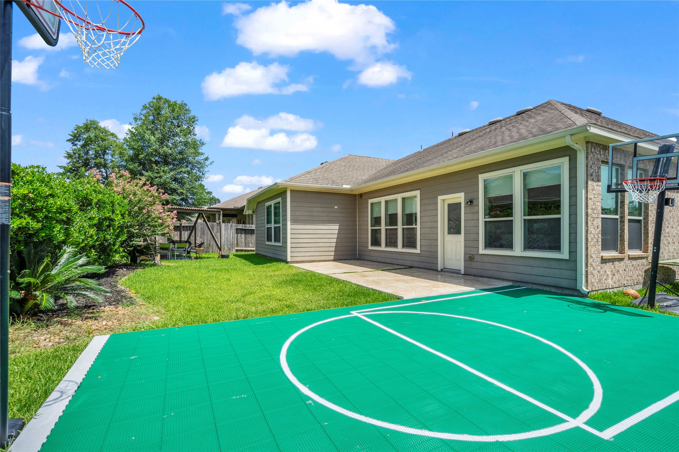 31503 Reston Cliff Court Spring, TX 77386 - Photo 26 of 28 a view of a house with a backyard