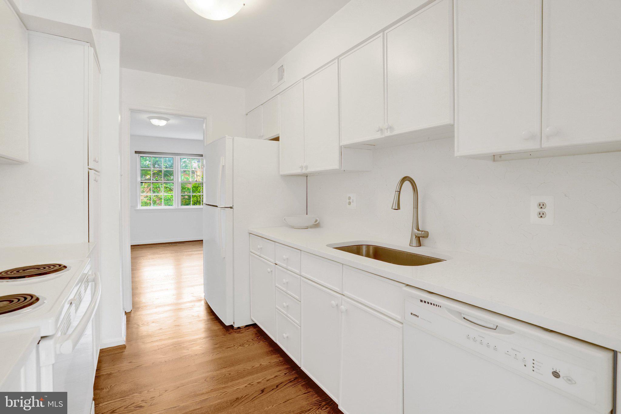 2225 North Tuckahoe Street Arlington, VA 22205 - Photo 11 of 37 a kitchen with a sink and cabinets