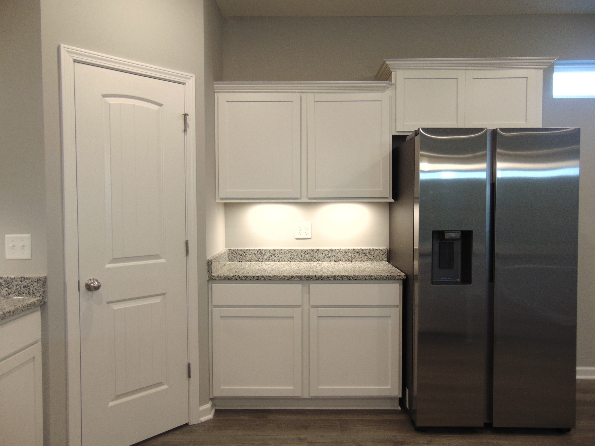 279 Spring Street La Vergne, TN 37086 - Photo 11 of 31 a kitchen with a refrigerator and cabinets