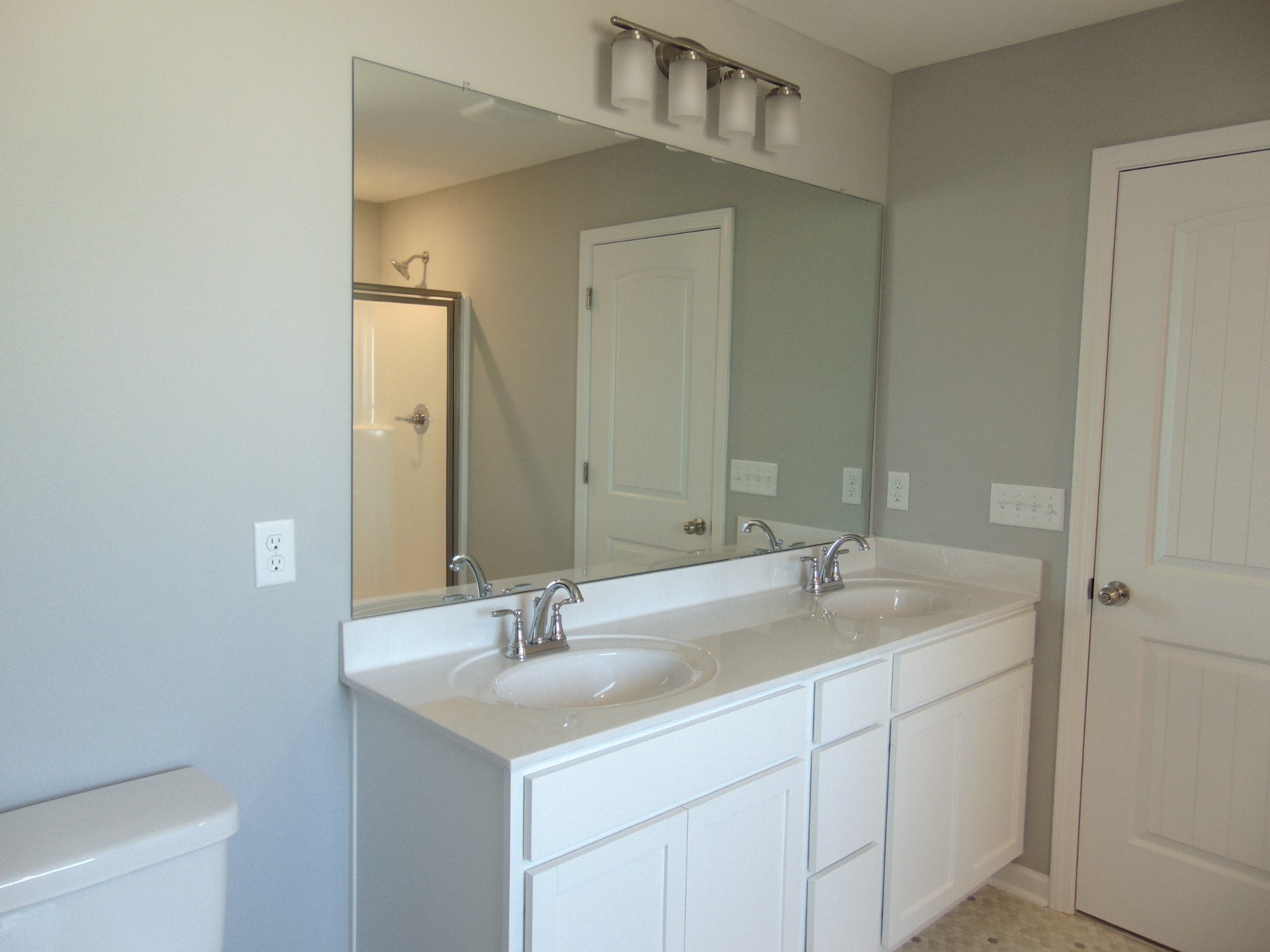 279 Spring Street La Vergne, TN 37086 - Photo 17 of 31 a bathroom with a sink and a mirror